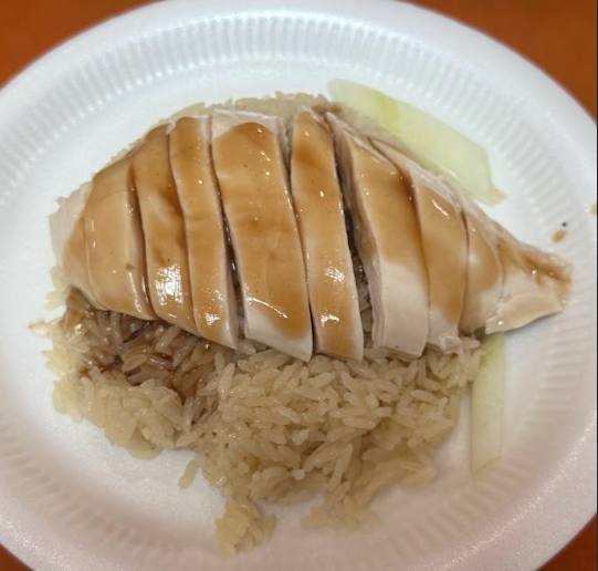 Sliced chicken over fragrant rice